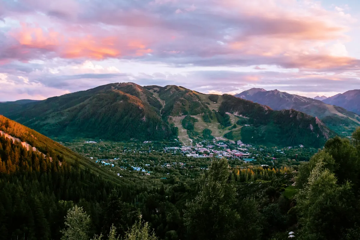 Aspen valley and mountains at sunset